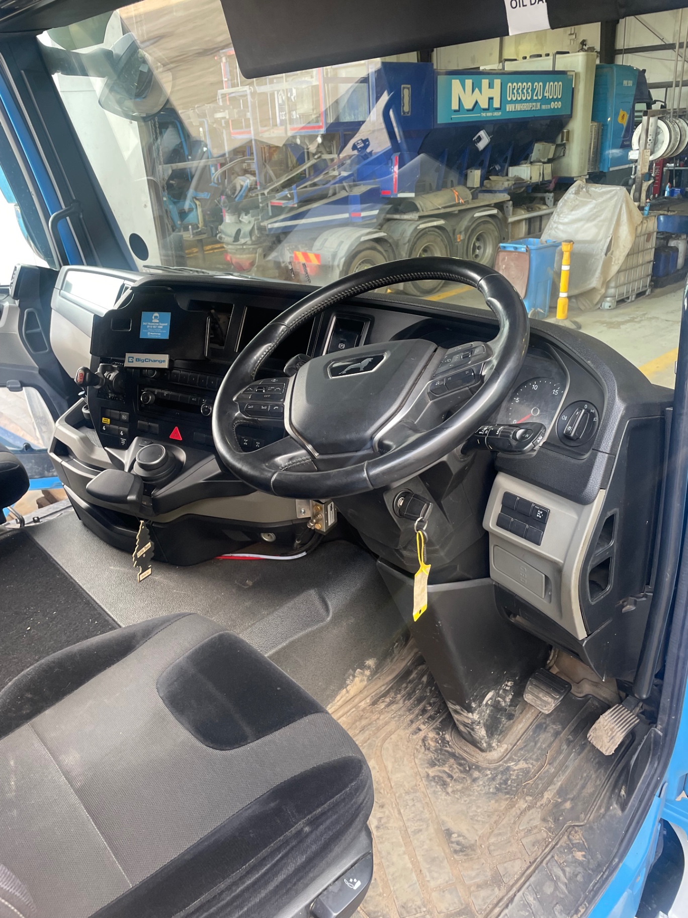 Lorry cab dashboard and muddy floor before an M&M Deluxe valet